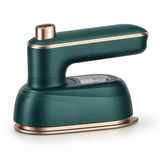 Mini vaporizador de roupas compacto verde com acabamento dourado
